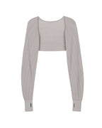 flat lay of light grey shrug