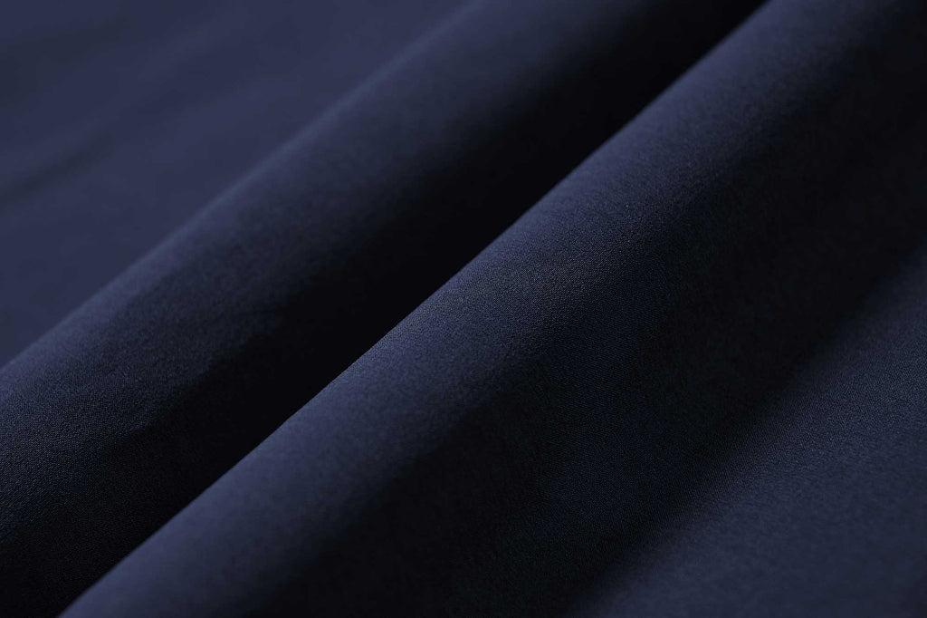 fabric detail of navy pants