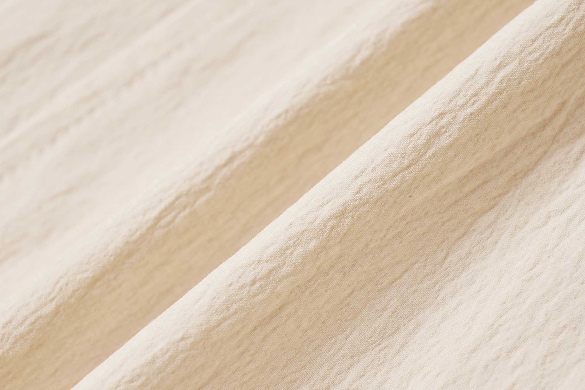 fabric detail of warm yellow shorts