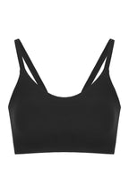 flat lay of black sports bra