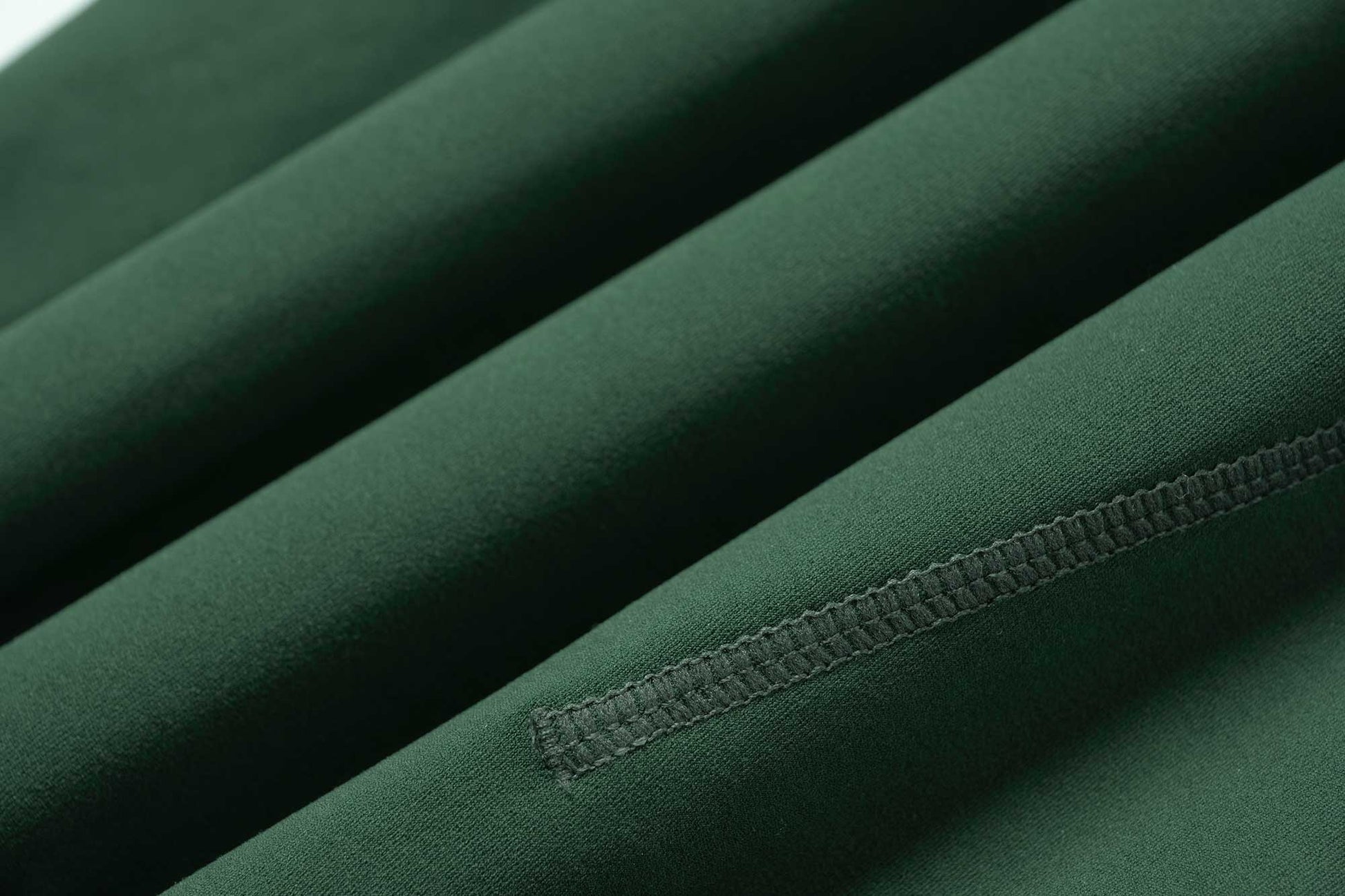 fabric detail of green biker shorts