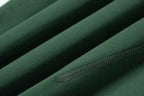 fabric detail of green biker shorts