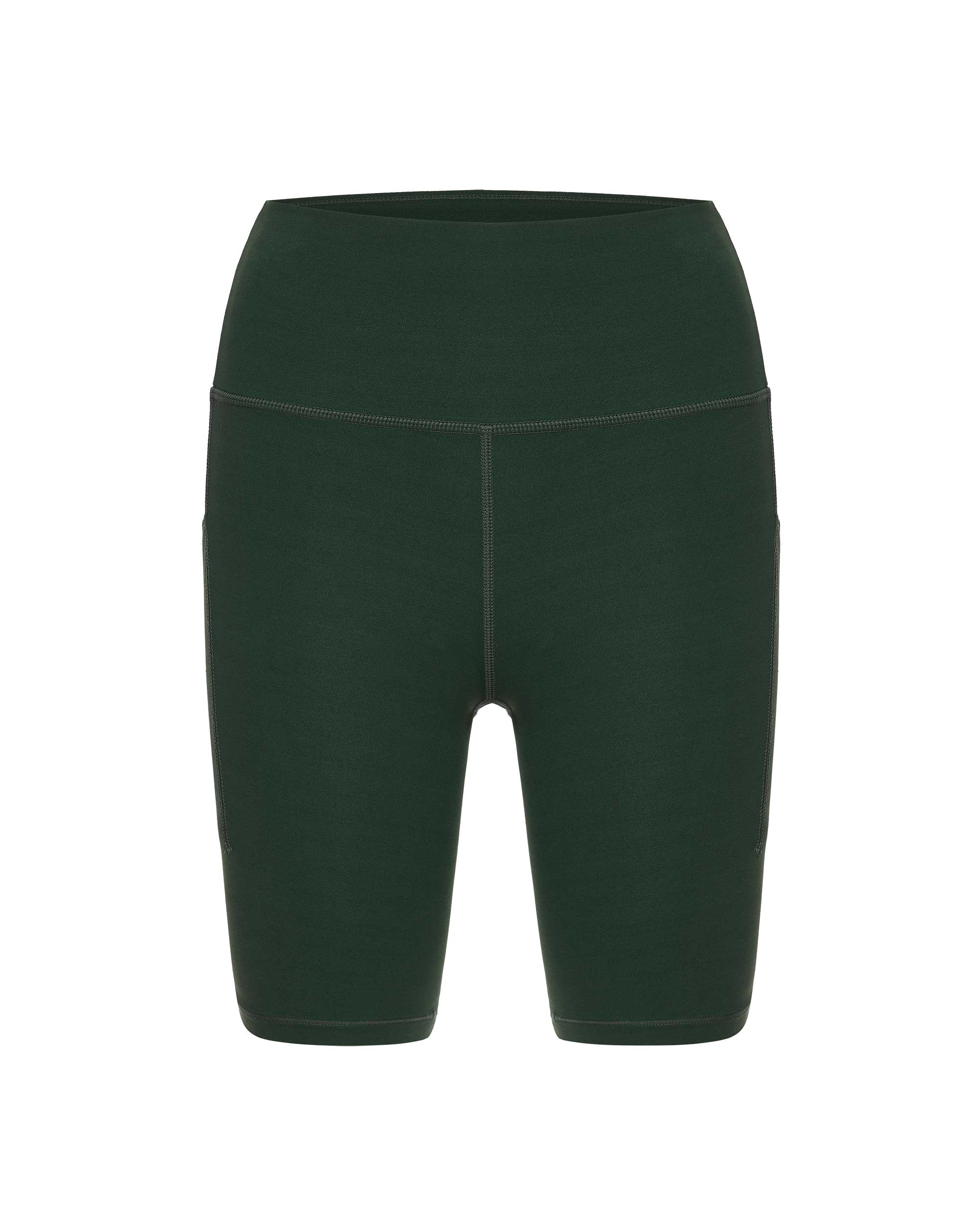flat lay of green biker shorts