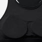 The image shows a close-up of the interior of a black racerback sports bra, highlighting its padded cups. 