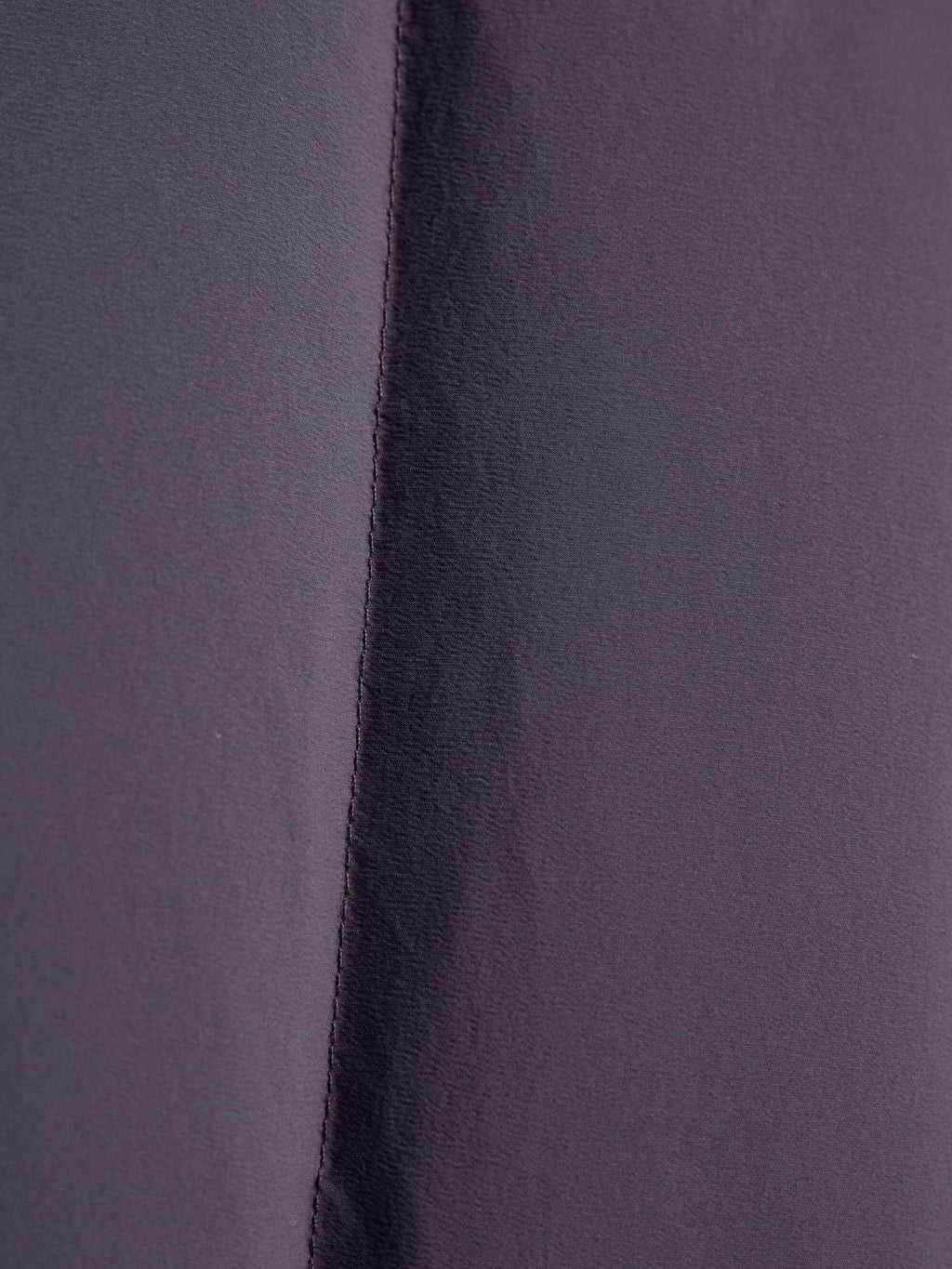 Fabric detail of purple cropped jacket