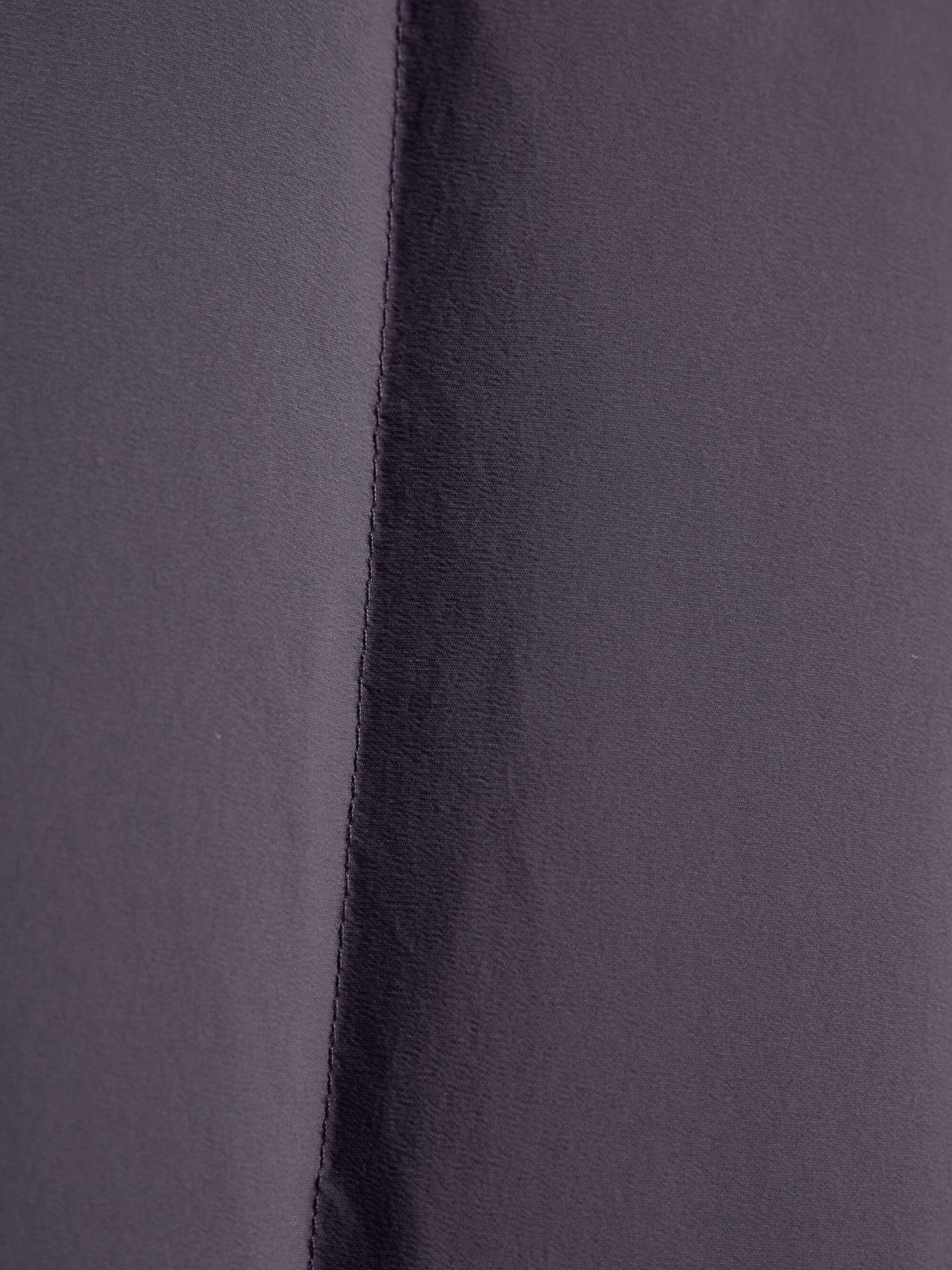 Fabric detail of purple cropped jacket