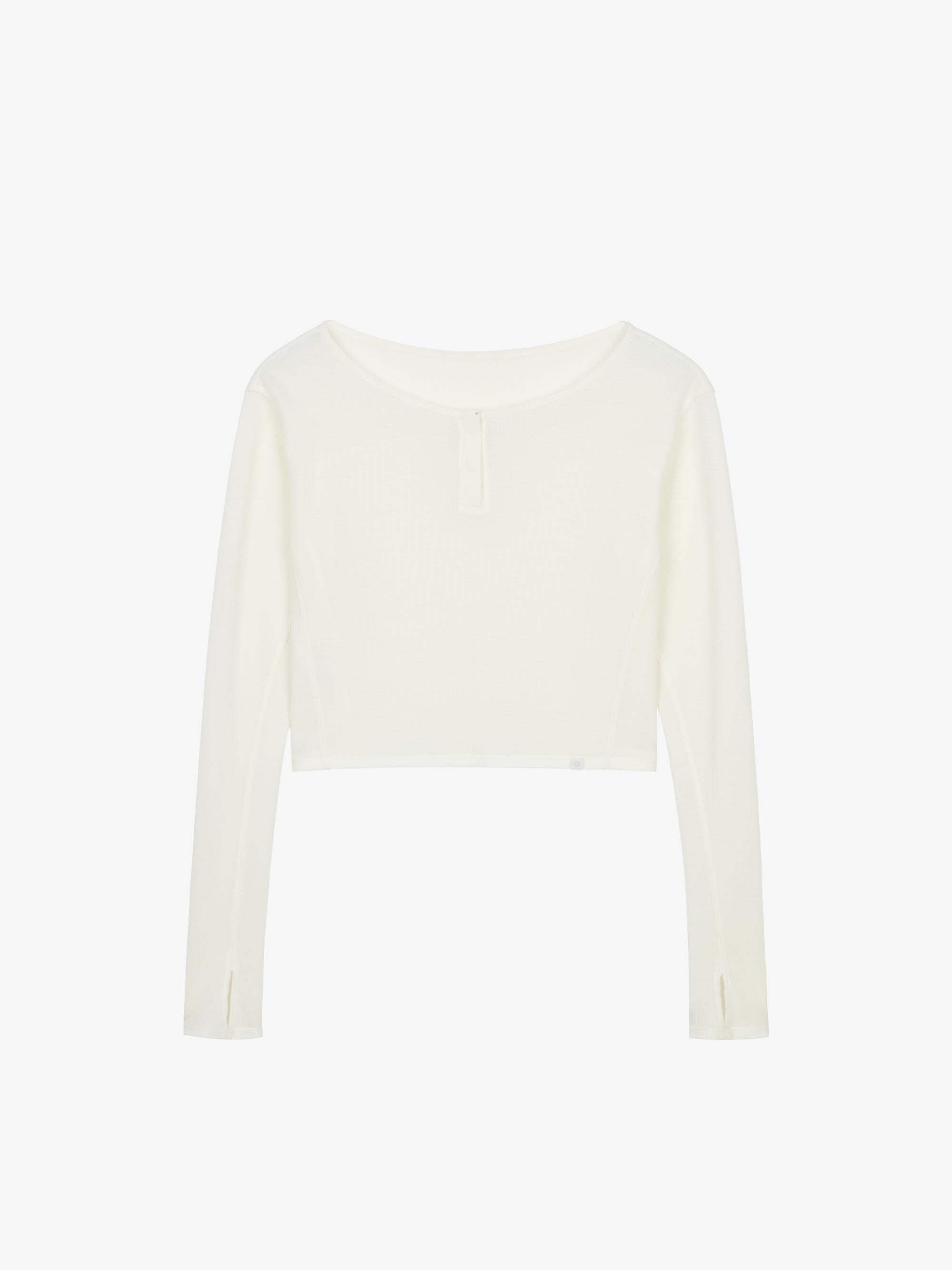 Flat lay of a white waffle long sleeve top, displayed flat against a white background