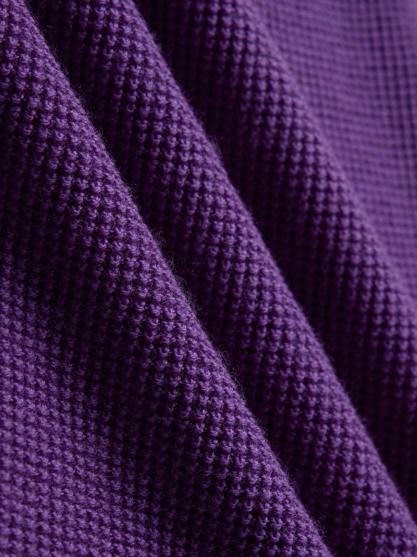 purple knitted fabric