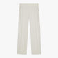 Flat lay of a pair of white straight-leg pants displayed on a white background, featuring a minimalist design with clean lines. The pants have a straight-leg cut, elastic waistband, and side pockets, showcasing a blend of comfort and style suitable for both casual and formal occasions.