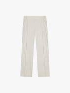 Flat lay of a pair of white straight-leg pants displayed on a white background, featuring a minimalist design with clean lines. The pants have a straight-leg cut, elastic waistband, and side pockets, showcasing a blend of comfort and style suitable for both casual and formal occasions.
