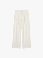 flat lay of white wide leg pants