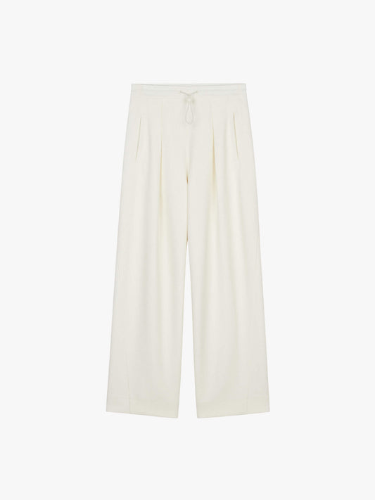 flat lay of white wide leg pants