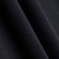 Close-up of black fabric, showing smooth texture and soft folds.