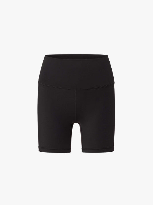 Flat lay of black high-waisted biker shorts displayed flat against a white background.