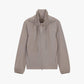 Product image of a taupe hooded jacket with a full front zipper, drawstring details at the neck, and elasticized cuffs.