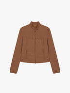 Flat lay of a toffee fitted zip-up jacket displayed flat against a white background.