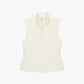 Flat lay image of white vest