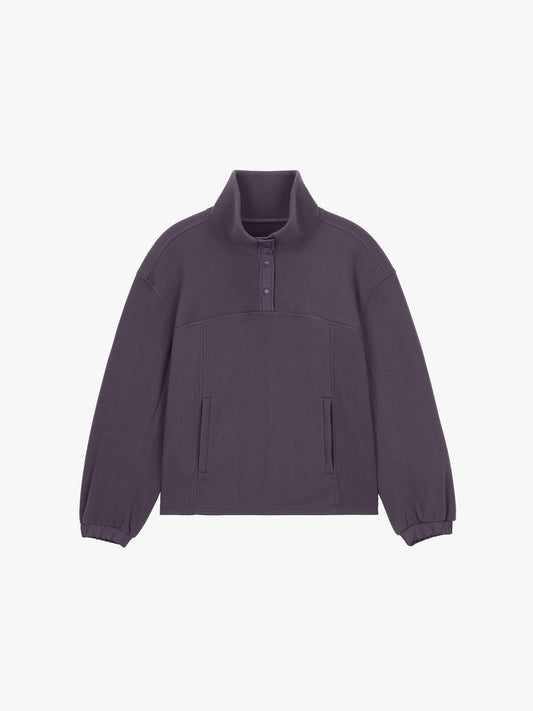 flat lay of dark purple fleece sweatshirt