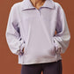 woman in light purple fleece sweatshirt