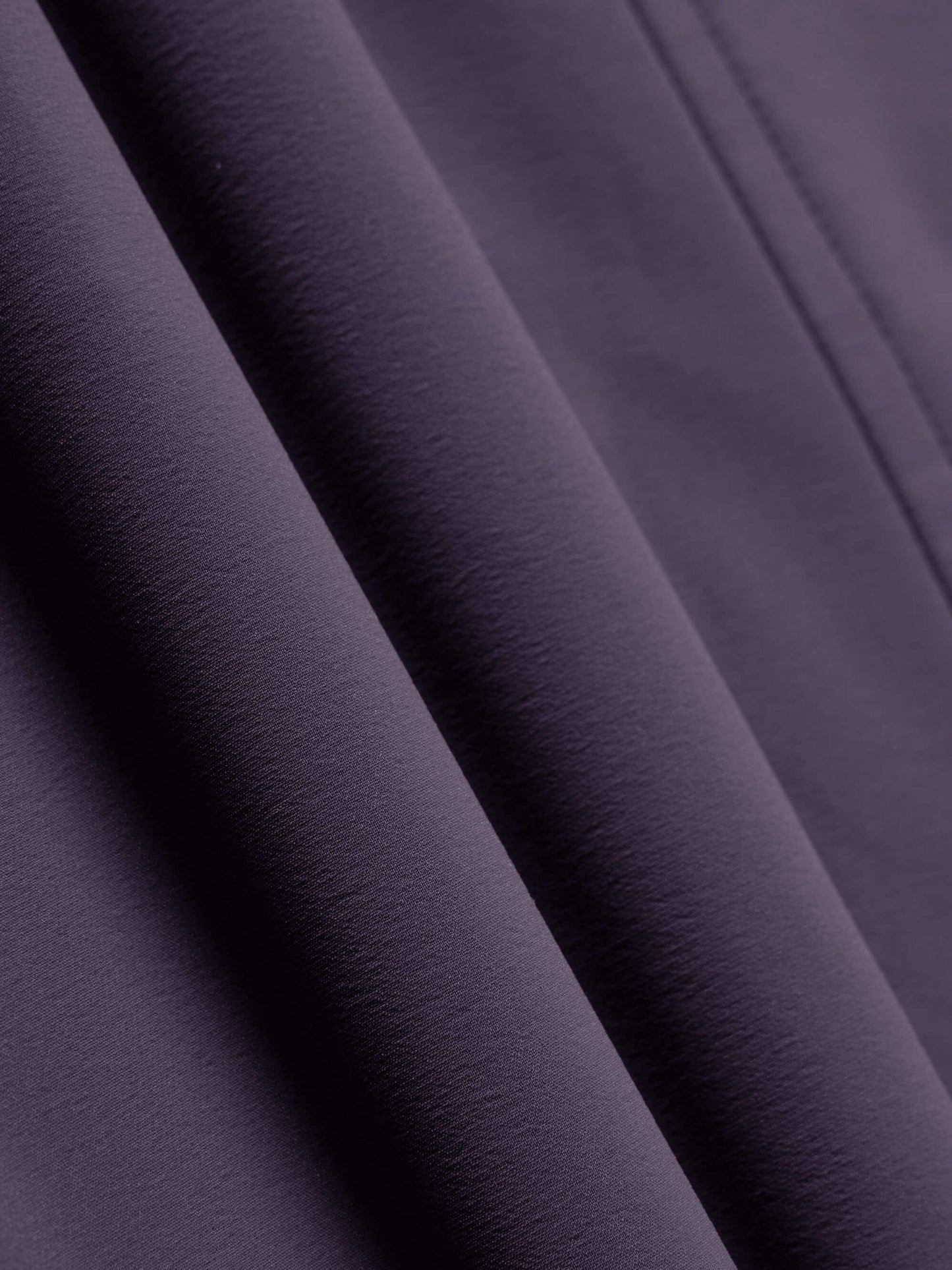 purple woven fabric