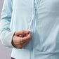 close up of blue jacket showcasing the zipper.