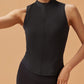 woman in black crew neck sleeveless top and black bottoms