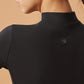 Back view of black long sleeve half zip top