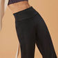 close up of woman in black wide leg pants