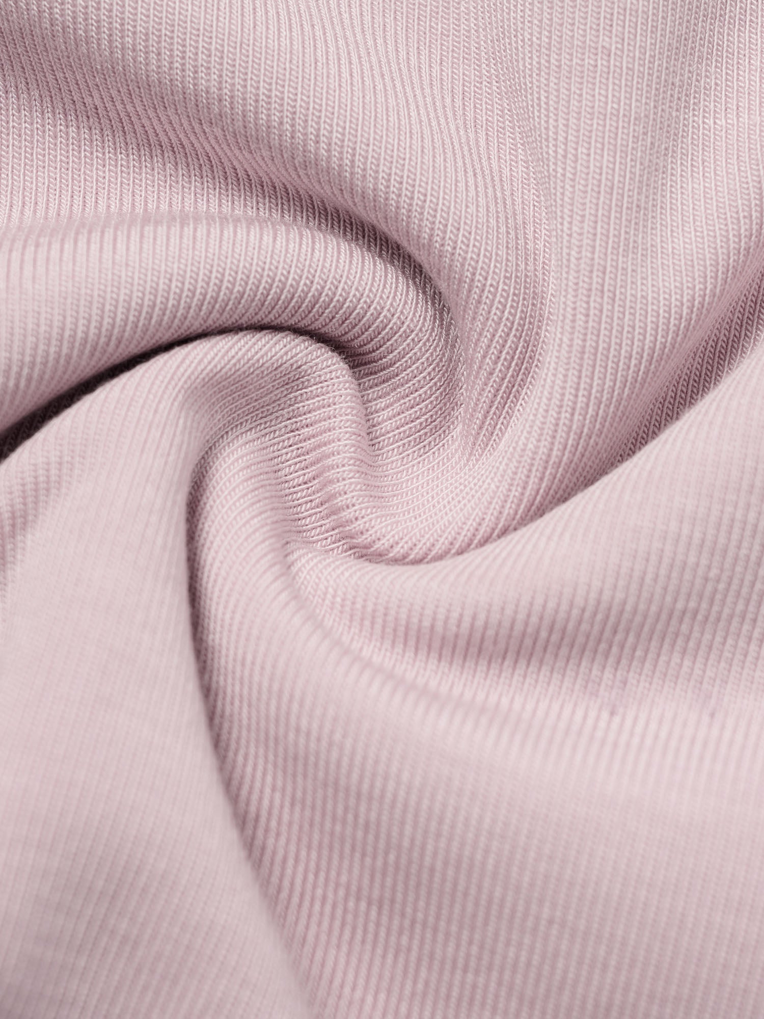 Closeup of light pink fabric 