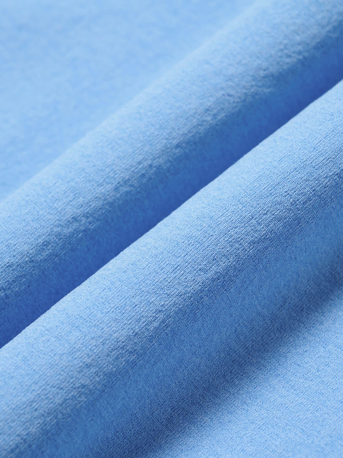 Closeup of light blue fabric 