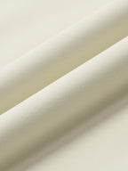 Close-up of beige fabric with a subtle texture