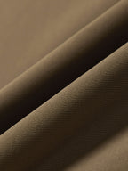 Close-up of brown fabric with a subtle texture