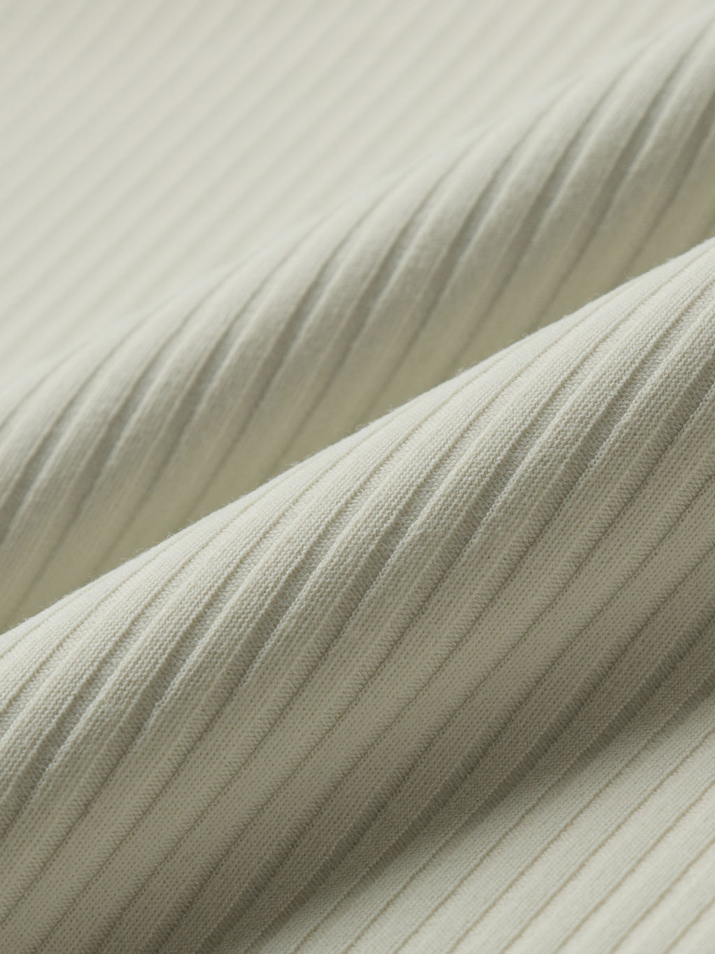 Close-up of textured fabric with a neutral color palette