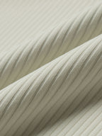 Close-up of textured fabric with a neutral color palette