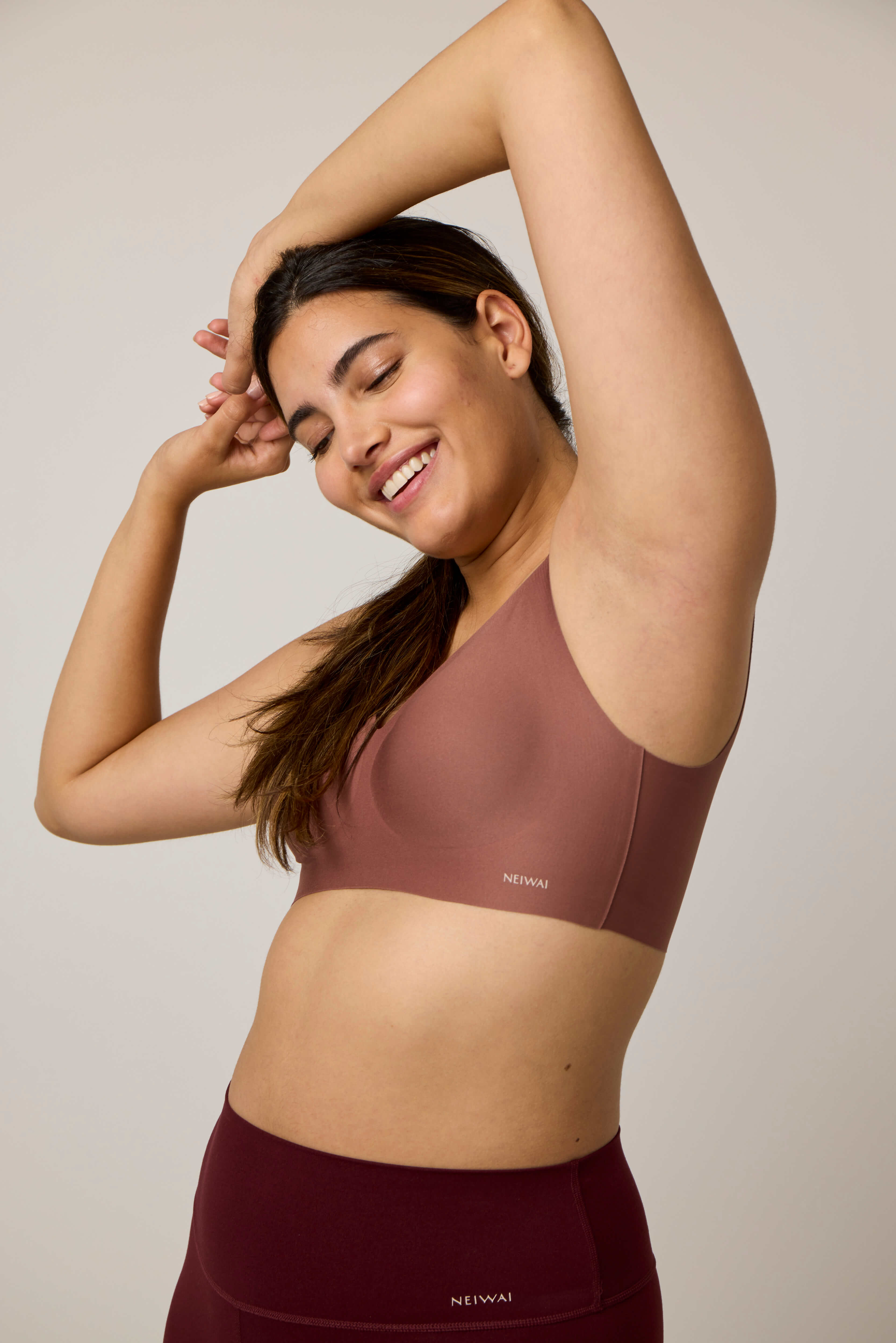 woman wearing brick color bra