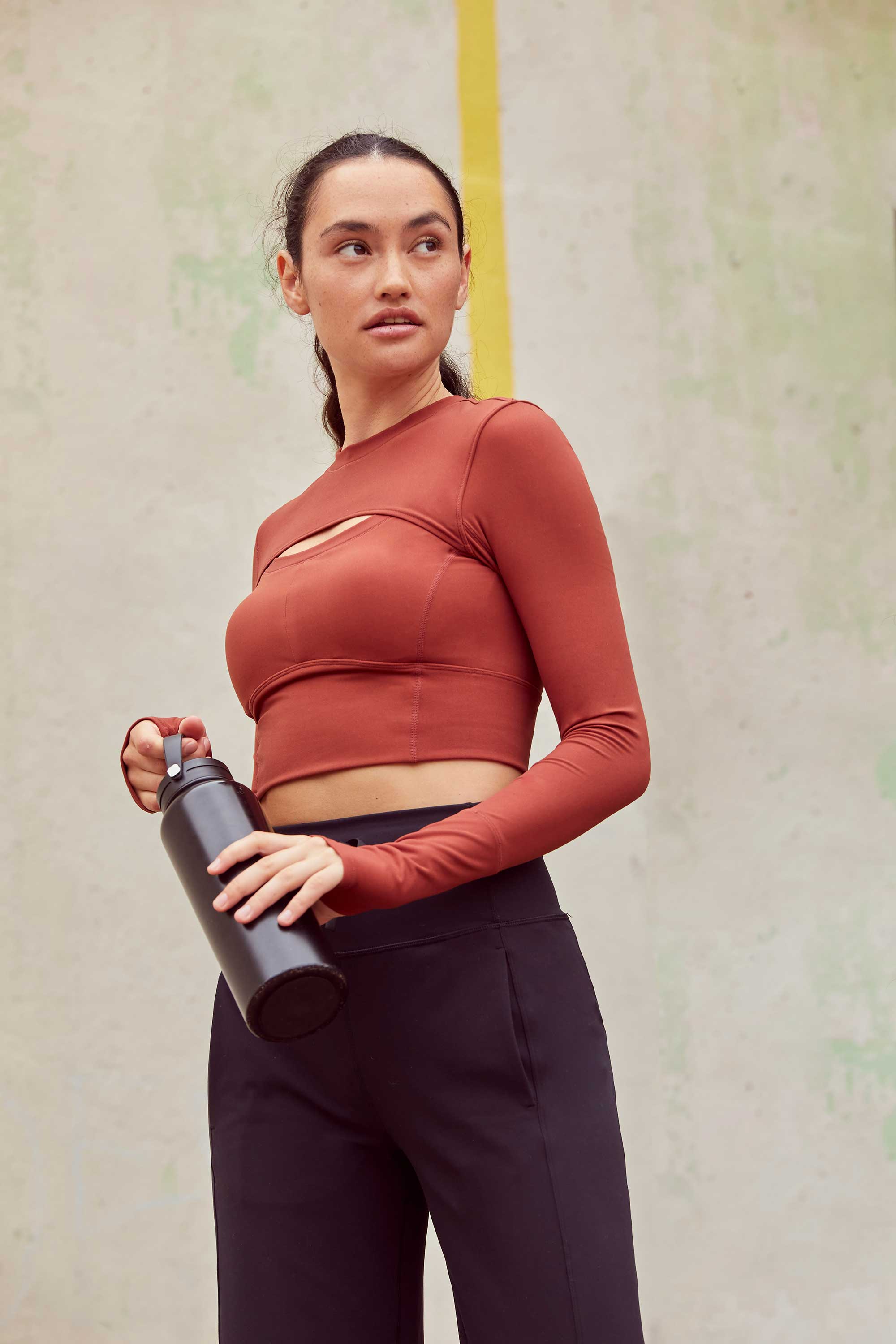 woman in Cut-out Padded Crop Top