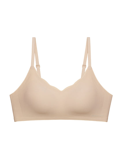 Flat lay of nude colored bra.