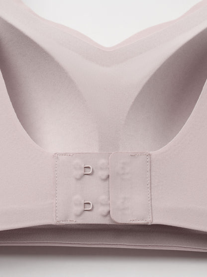 Close-up of a light purple bra with a focus on the band and cup area.