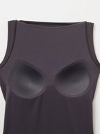 Black tank top with silicone bra inserts on a white background