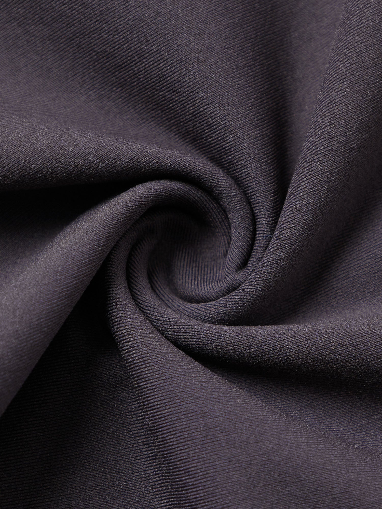 Close-up of dark gray fabric with folds