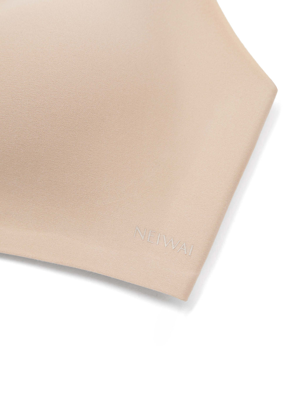Beige bra detailing with brand logo on a white background