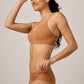 woman wearing a caramel color bra and matching briefs