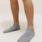 a person wearing a blue socks