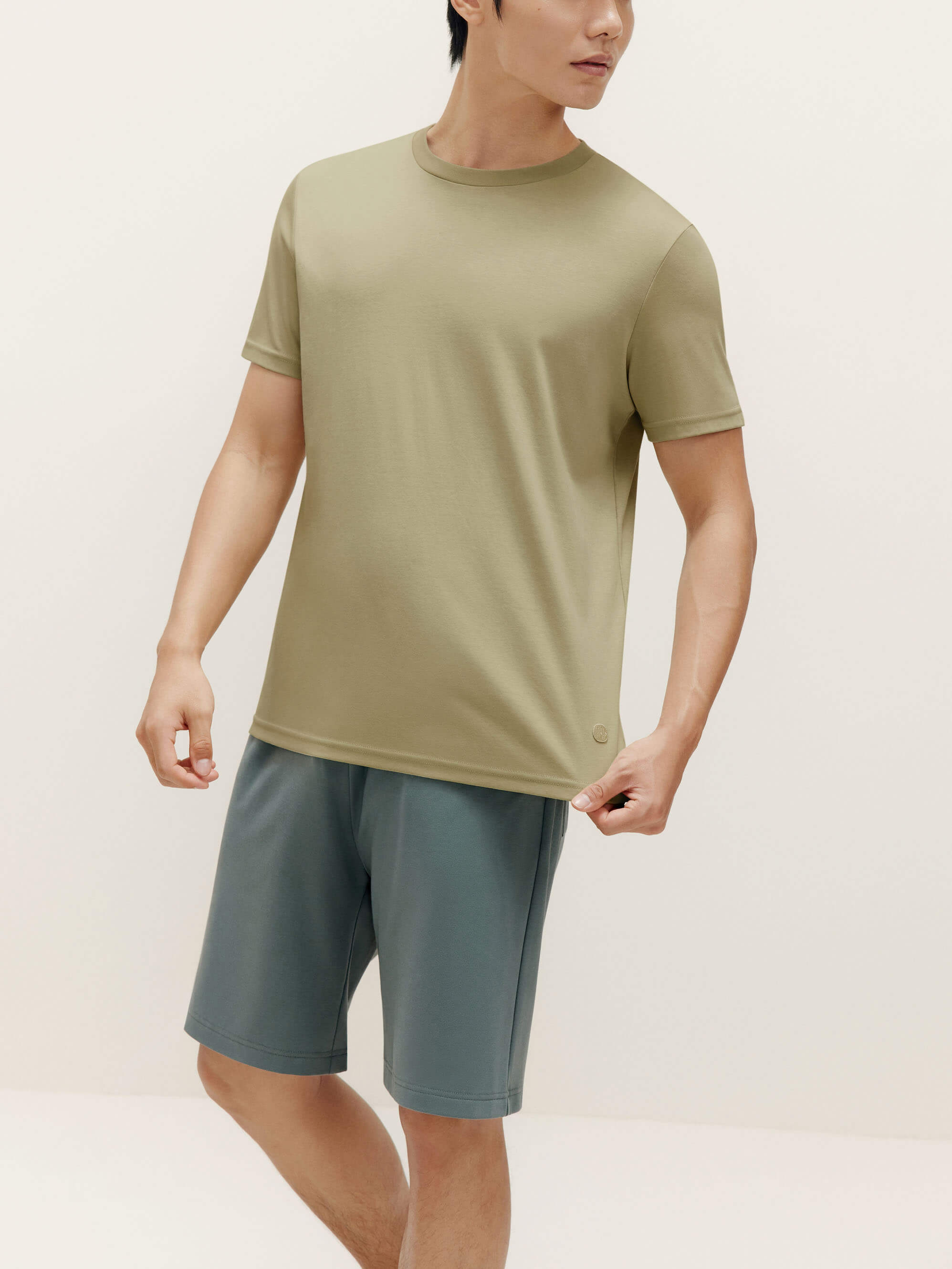 Green t shirt and shorts hotsell