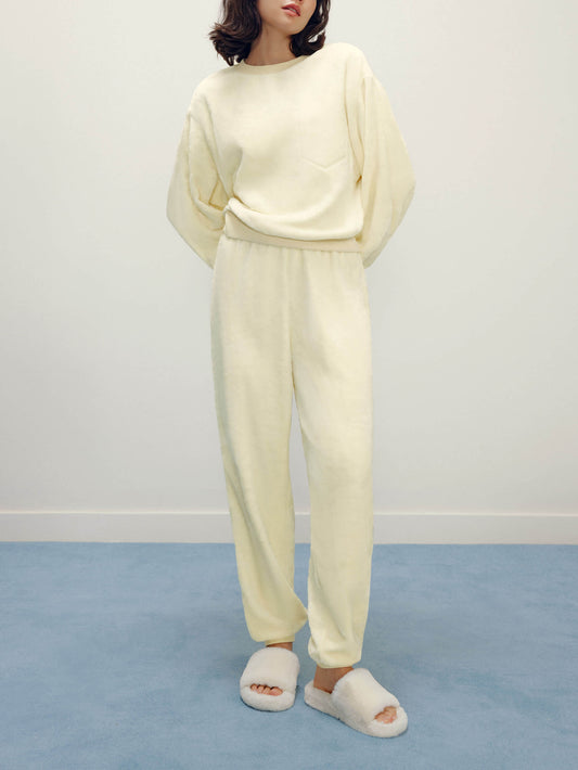 Women with cream color fluffy loungewear set