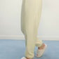 Women Legs with cream color fluffy lounge pants