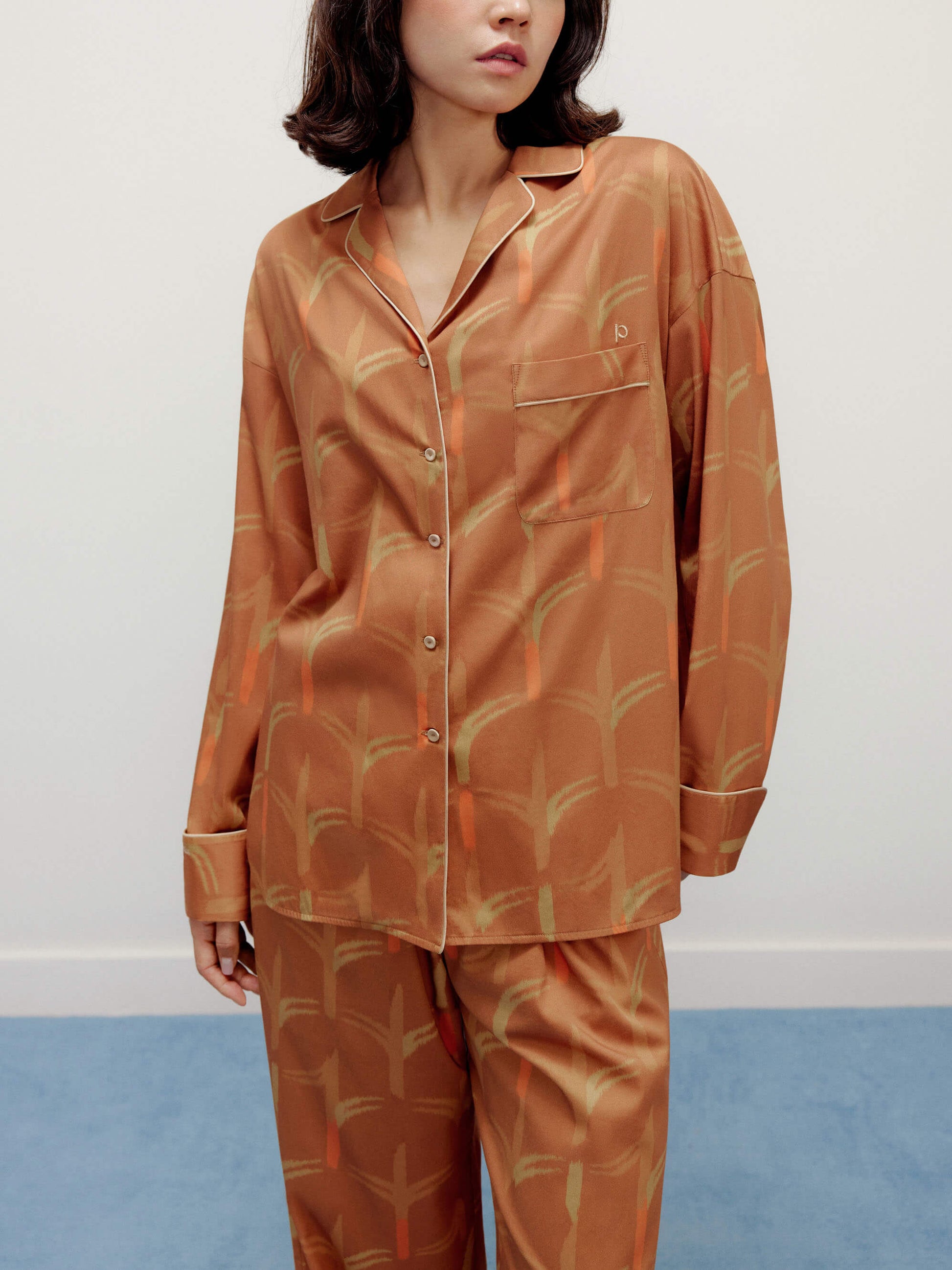 woman wearing brown pajama set