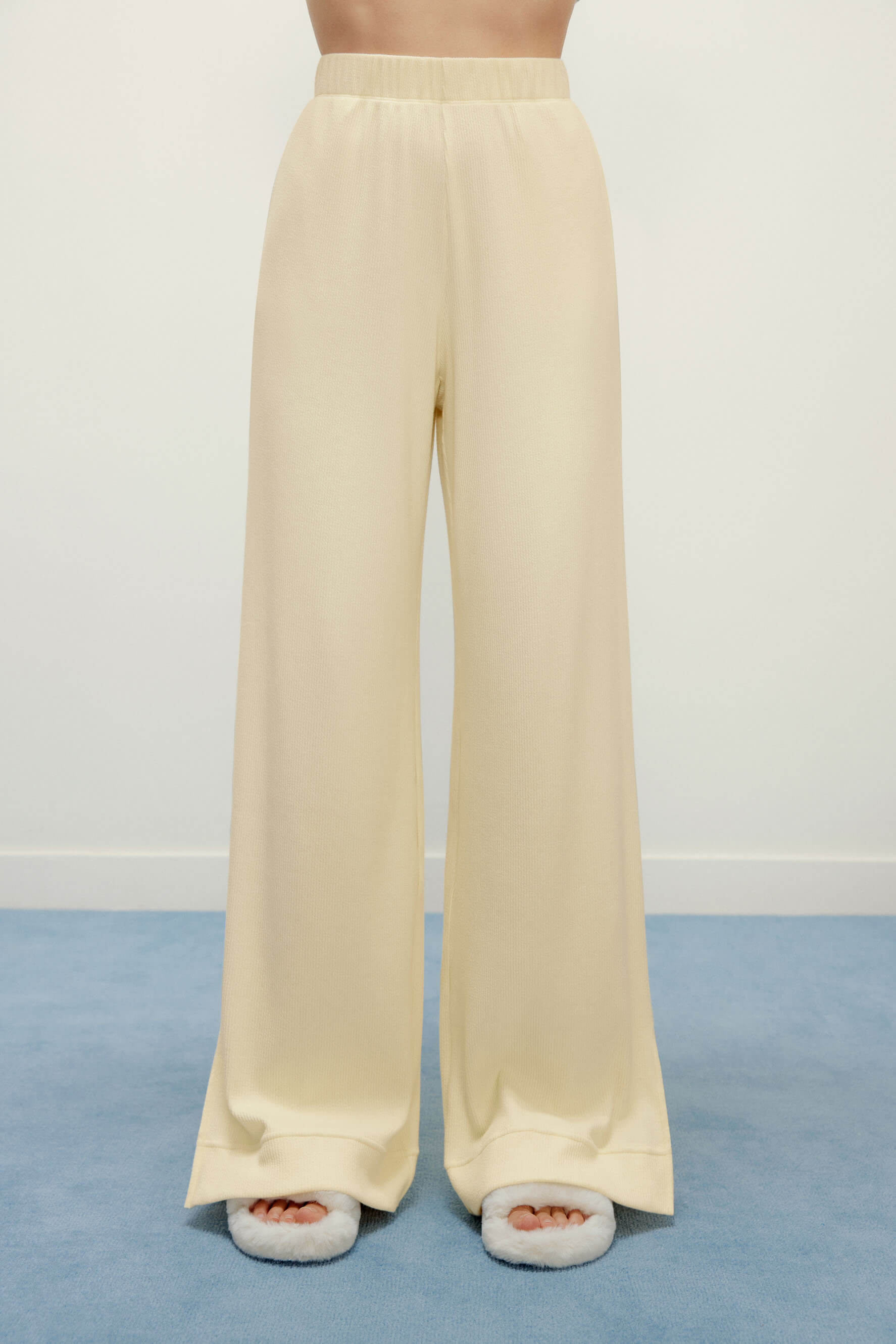 woman in yellow pajama pants
