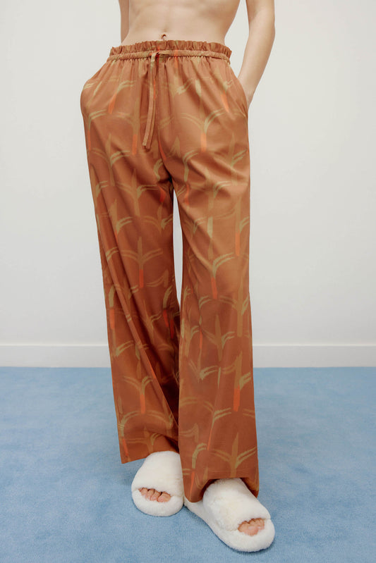 female model waring brown pajama pants