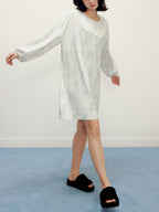 woman wearing a ruched dress